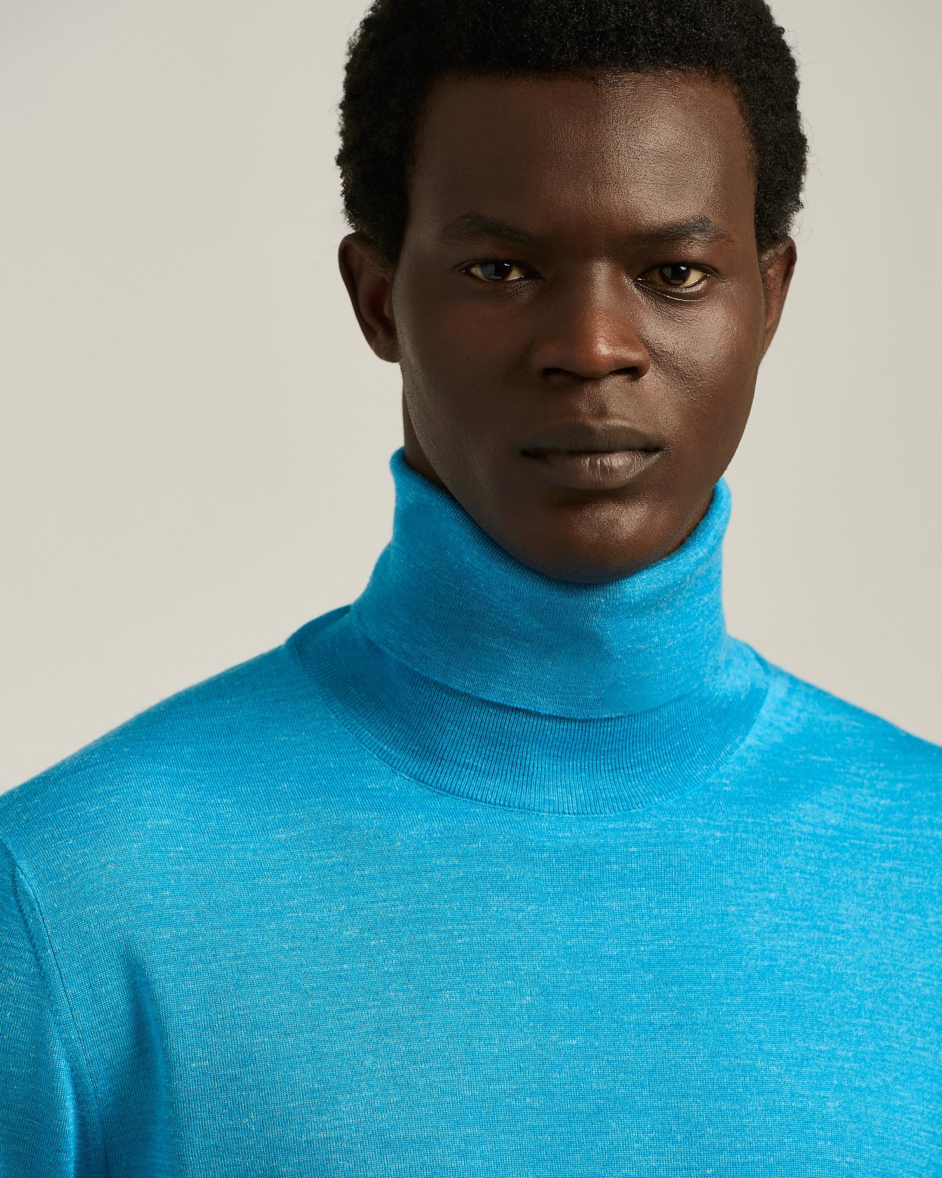 SKY BLUE SILK AND “DIAMANTE BLU” WOOL TURTLENECK