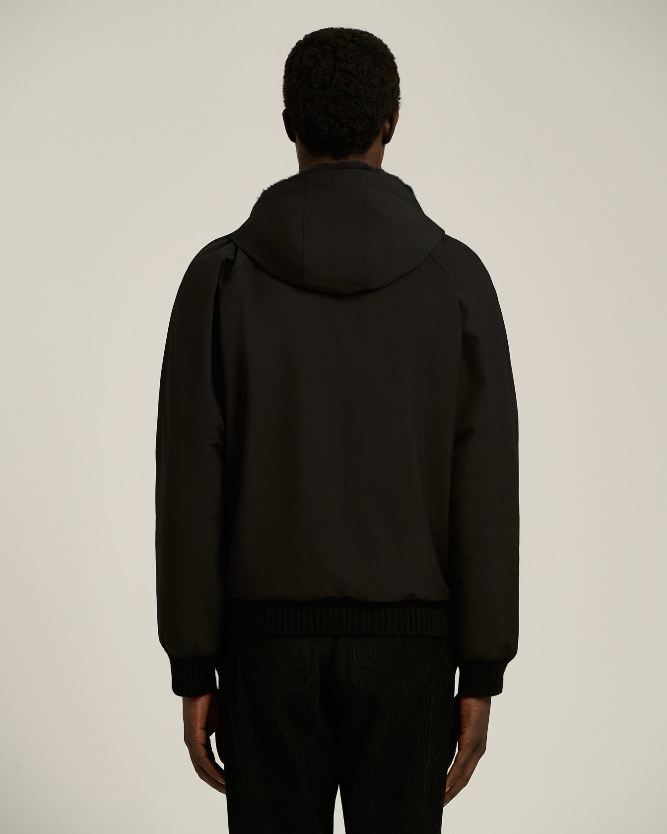 BLACK HOODED JACKET LINED WITH WEASEL FUR