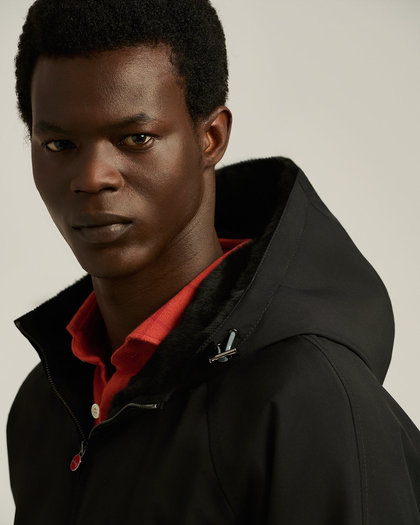 BLACK HOODED JACKET LINED WITH WEASEL FUR